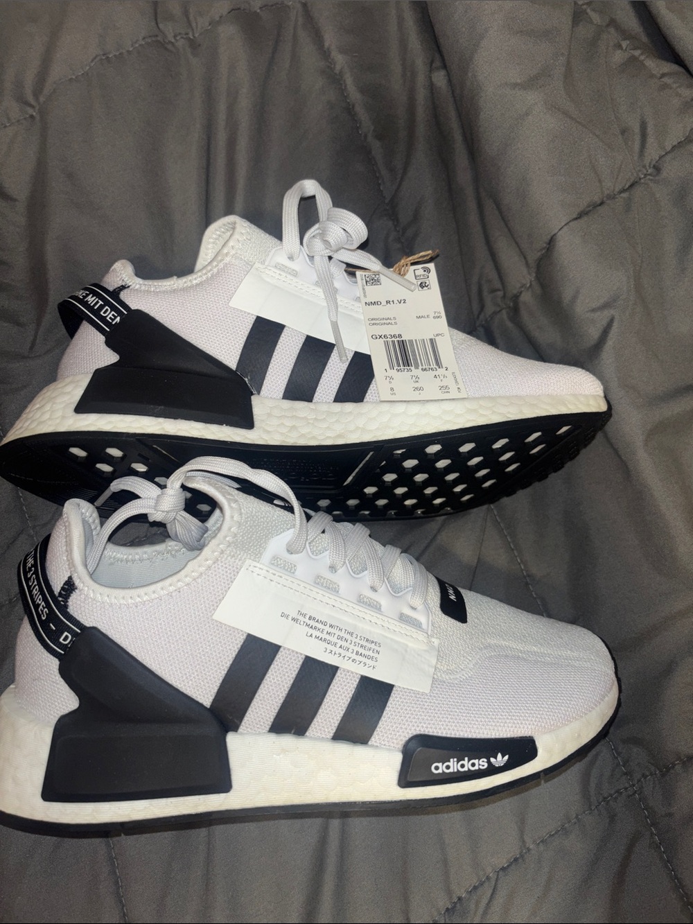 adidas Men’s White & Black NMD_R1 Primeknit Sneakers